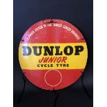 A Dunlop Junior Cycle Tyre cardboard tyre insert advertisement, 18" diameter.
