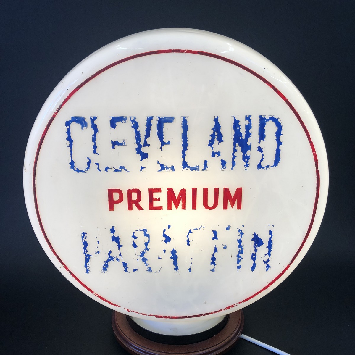 A rare Cleveland circular glass petrol pump globe bearing Cleveland Premium Paraffin lettering to - Image 2 of 3