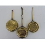 Three good quality polished brass Continental oilers.