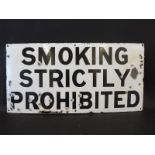 A 'Smoking Strictly Prohibited' rectangular enamel sign, 24 x 12".