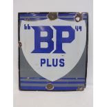 A BP Plus rectangular enamel sign with shield motif to the centre, painted to the reverse: