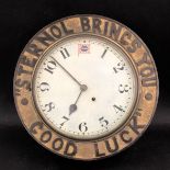 A rare Sternol circular wall clock bearing the words to the case: Sternol Brings You Good Luck,