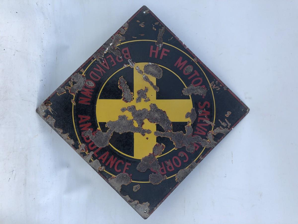 A Harvey Frost Motor Salvage Corps. Breakdown Ambulance lozenge shaped enamel sign, 22 1/2 x 22 1/