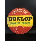A Dunlop Tourist Sprite circular cardboard tyre insert advertising sign dated 1951, 24" diameter.