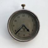 A Smiths silver faced eight day car clock, top wind.