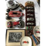 A selection of pewter Royal Hampshire models of motorcars and motorcycles, various other motoring