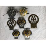 A selection of AA badges including a large Stenson Cooke Secretary badge no. 4395.