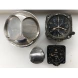A Jaeger eight day car clock type no. 1650R and a Smiths eight day car clock with time trip to the