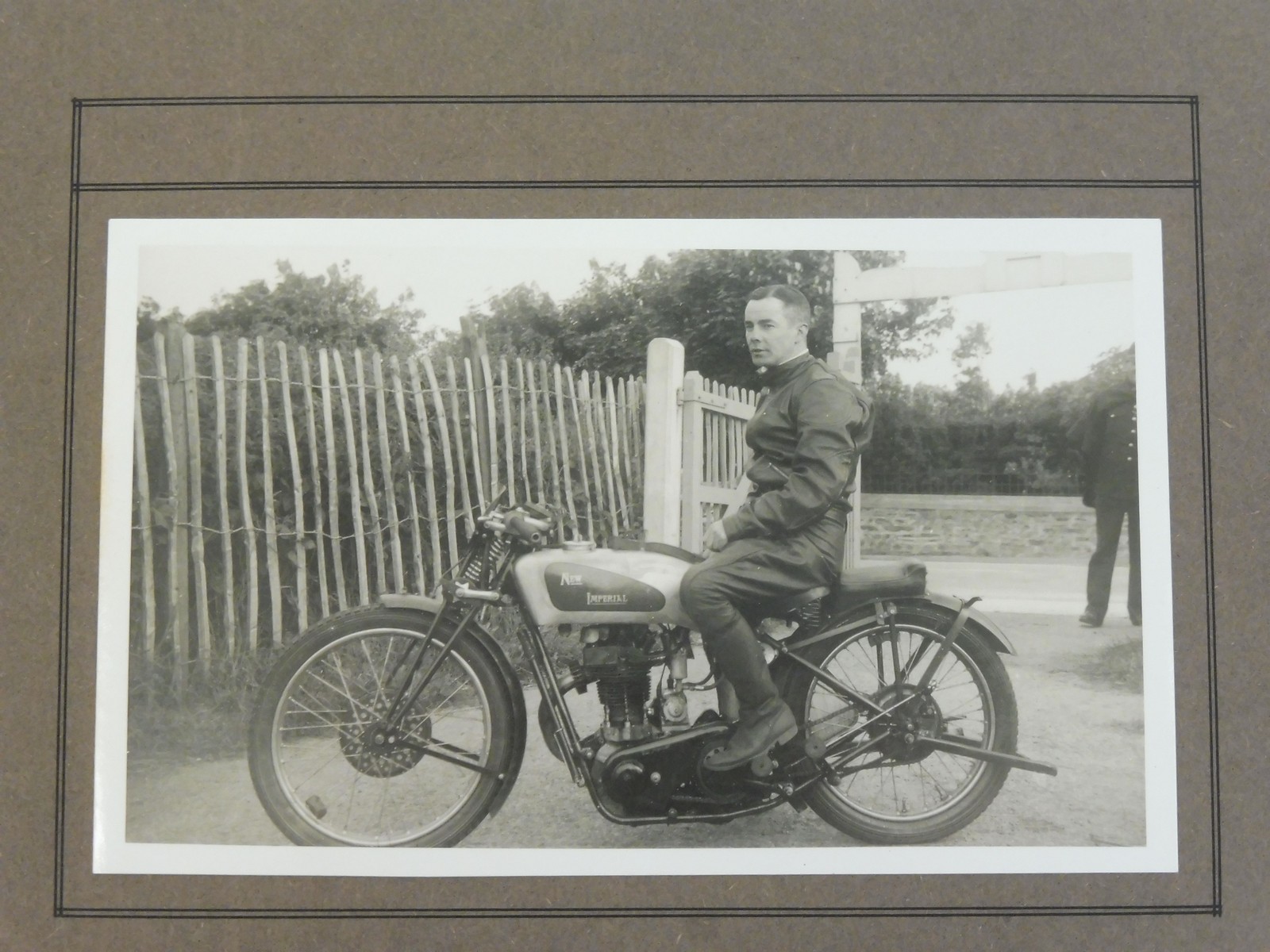 An interesting early photograph album containing many black and white photographs including The TT