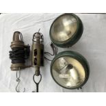 Two wartime hanging inspection lamps plus two Ford Popular lenses.