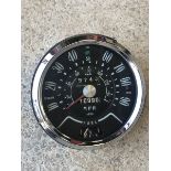 A Triumph Herald 0-90mph black faced speedometer by Jaeger.