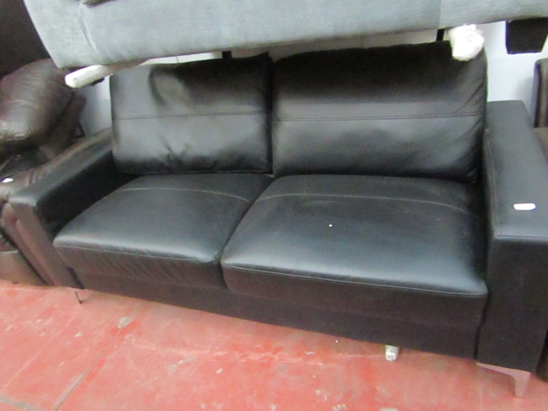 Costco 2 Seater Black Leather style sofa, Damaged back Cushion