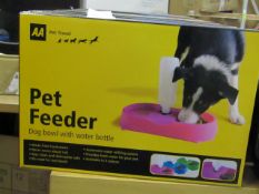 AA Pet Feeder dog bowl with water bottle, new and boxed.
