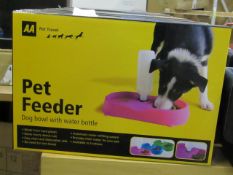 AA Pet Feeder dog bowl with water bottle, new and boxed.