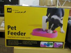 AA Pet Feeder dog bowl with water bottle, new and boxed.