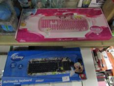 2x Disney keyboards, both new and boxed.