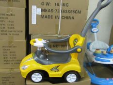 Yellow Lights and Sounds Childs Ride on car with parental handle, features removable anti fall rails