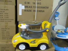 Yellow Lights and Sounds Childs Ride on car with parental handle, features removable anti fall rails