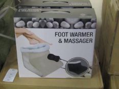 Foot Warmer and Massager, new and boxed in Black, Features hand held control and Soft Polar fleece