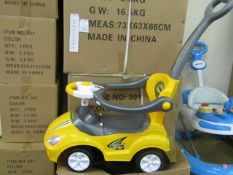 Yellow Lights and Sounds Childs Ride on car with parental handle, features removable anti fall rails