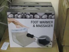 Foot Warmer and Massager, new and boxed in Black, Features hand held control and Soft Polar fleece