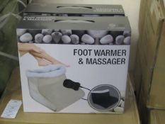 Foot Warmer and Massager, new and boxed in Black, Features hand held control and Soft Polar fleece