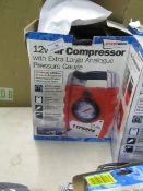 12v Air compressor, unchecked and boxed.