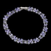 High Value - This Amazing Natural Tanzanite Bracelet is set with 60 x 4mm x 3mm Pear cut & 14 x