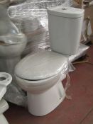 Unbranded Roca toilet pan with seat & cistern to match (also comes with flush system). All new &