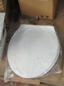 Plastic toilet seat - white. New in packaging.