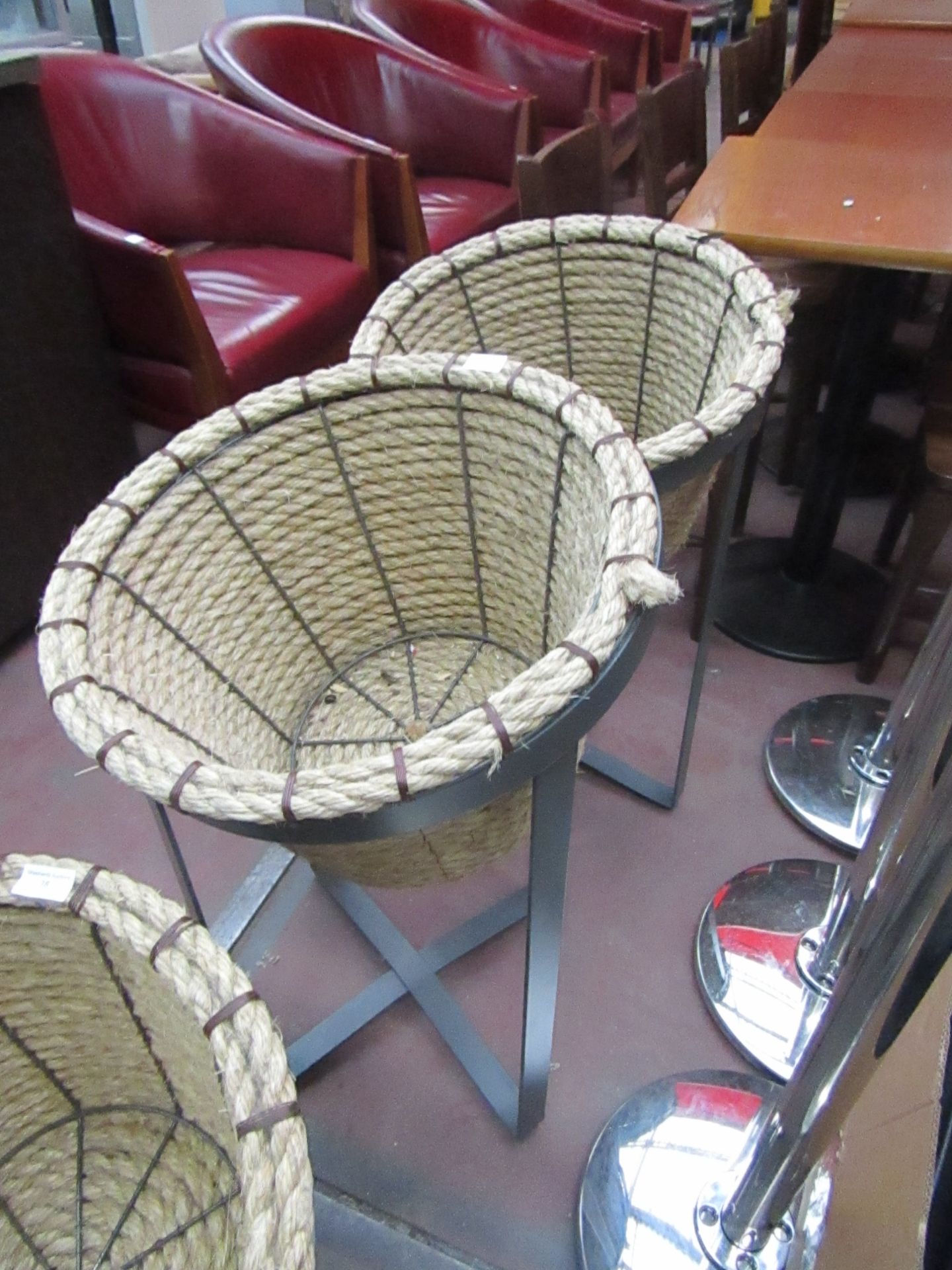 2x Large wicker baskets for holding coffee.