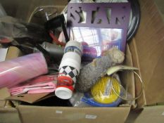 Box of various items such as a dog ornament , Hannah Montana frame and much more