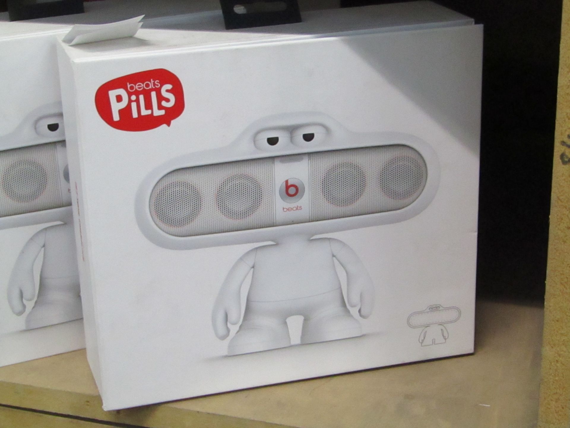 Beats Pills speaker stand, boxed.