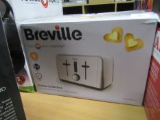 Breville stainless steel 4 slice toaster, tested working and boxed.