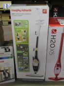 Morphy Richards 9 in 1 upright and handheld steam cleaner, powers on and boxed.