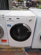 Maytag IntelliSense 8Kg washing machine, powers on and spins.