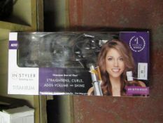In Styler titanium rotating iron. Unchecked & boxed.