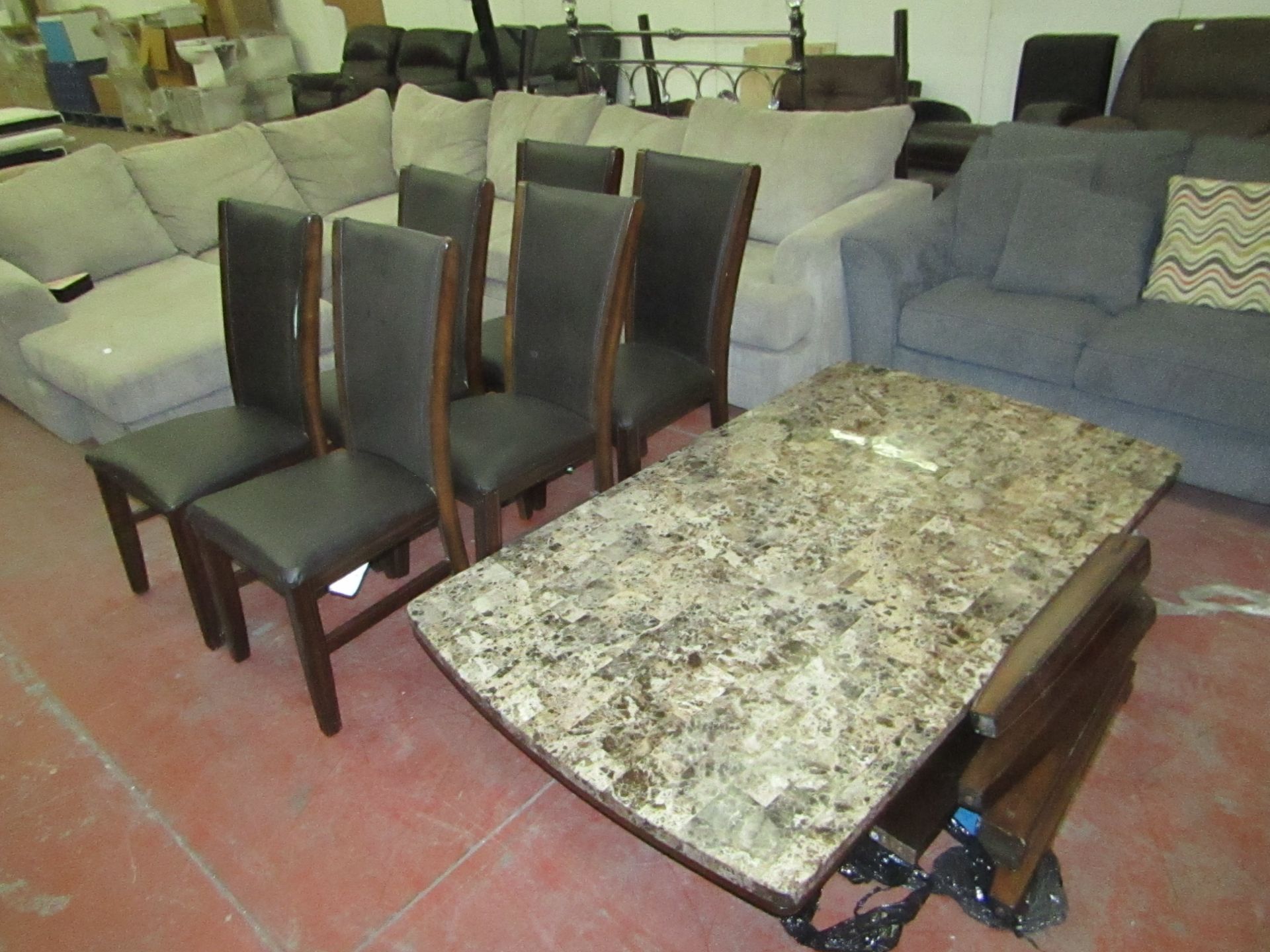 Bayside Stone topped Dining table and 6 chairs, the stone top looks to be undamaged from a quick