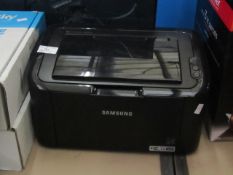 Samsung monochrome laser printer ML-1865W. Unchecked.