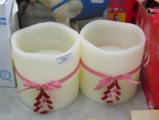 Set of 2 large candles.