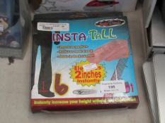 Insta-tall, gain 2 inches. Unchecked & boxed.