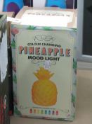 Colour changing pineapple mood light. Unchecked & boxed.