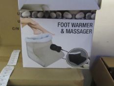 Foot Warmer and Massager, new and boxed in Black, Features hand held control and Soft Polar fleece