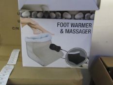 Foot Warmer and Massager, new and boxed in Black, Features hand held control and Soft Polar fleece