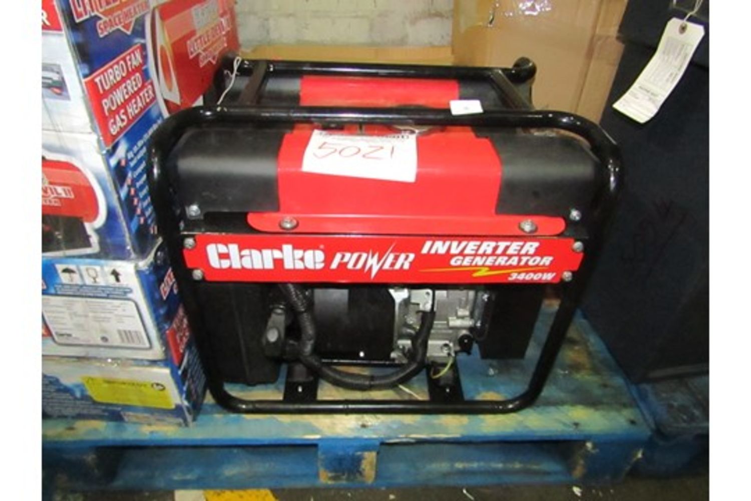 New delivery of Machine Mart raw and returns auction containing; wide range of Clarke items, jump starters, garages, shelving and much more!!