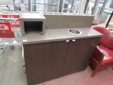 Beverage counter-top unit with built in rubbish bin.