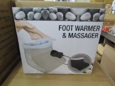 Foot warmer, beige colour, new and boxed.