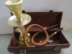 Shisha burner with pipe but missing some pieces , in case.