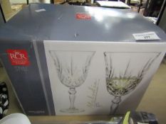 RCR 4 piece glass set, was a 6 piece glass set but 2x glasses missing. Boxed.