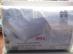 1 x pack of 4 Herzberg pillows , new and packaged.